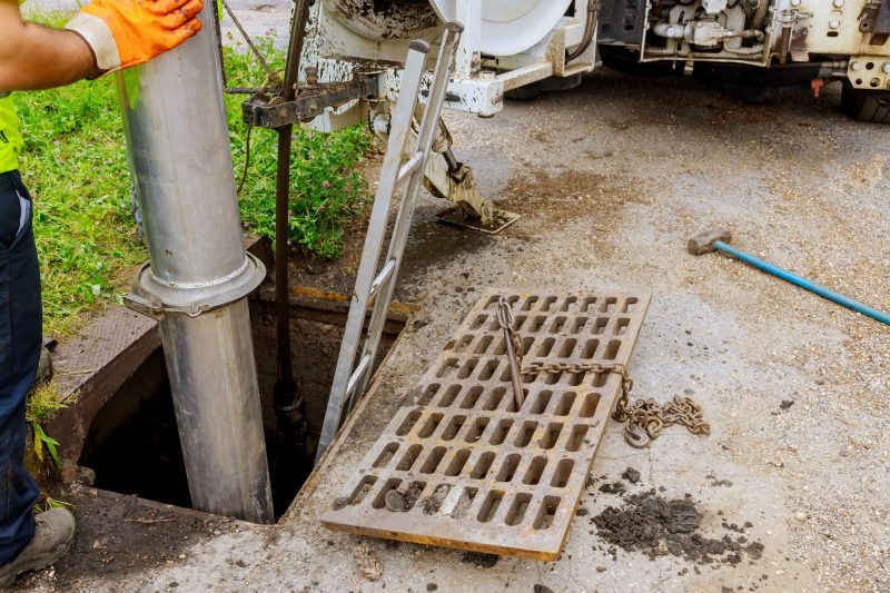 Sewage industrial cleaning truck clean blockage in a sewer line machine from the inside.